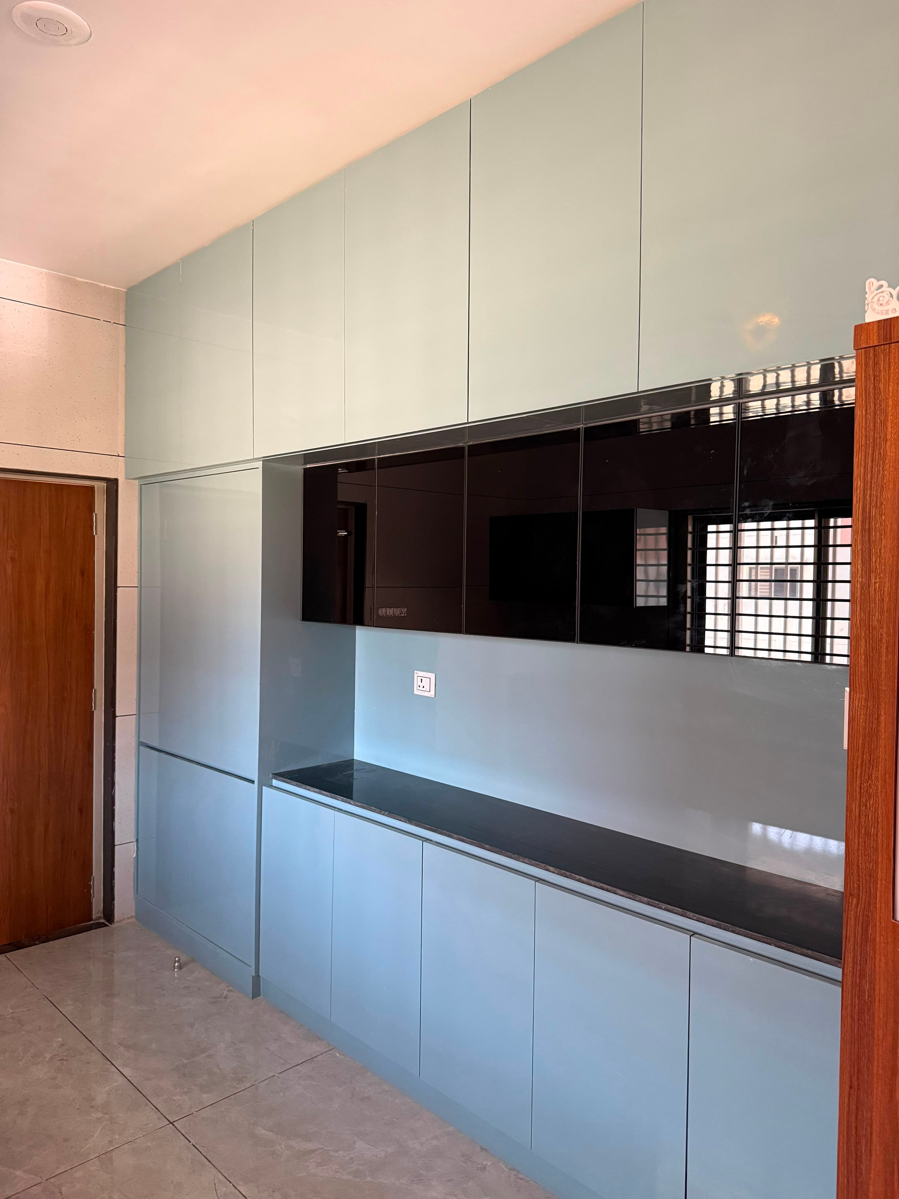 RAVYA kitchen project — kitchen island and cabinetry.