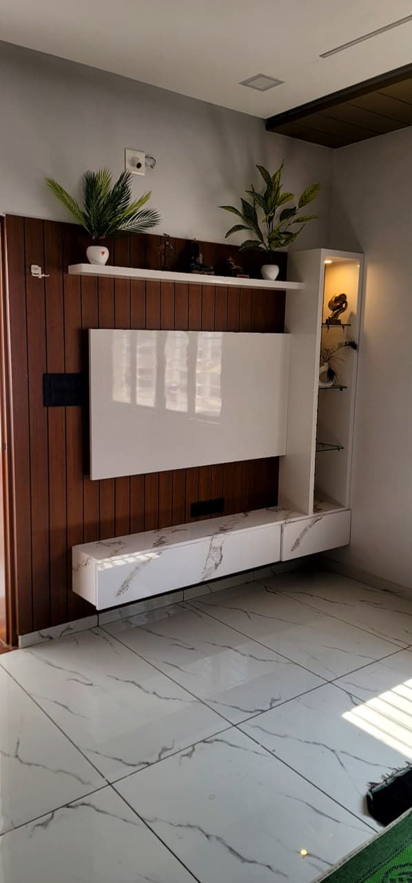 RAVYA living room project — media wall and storage.