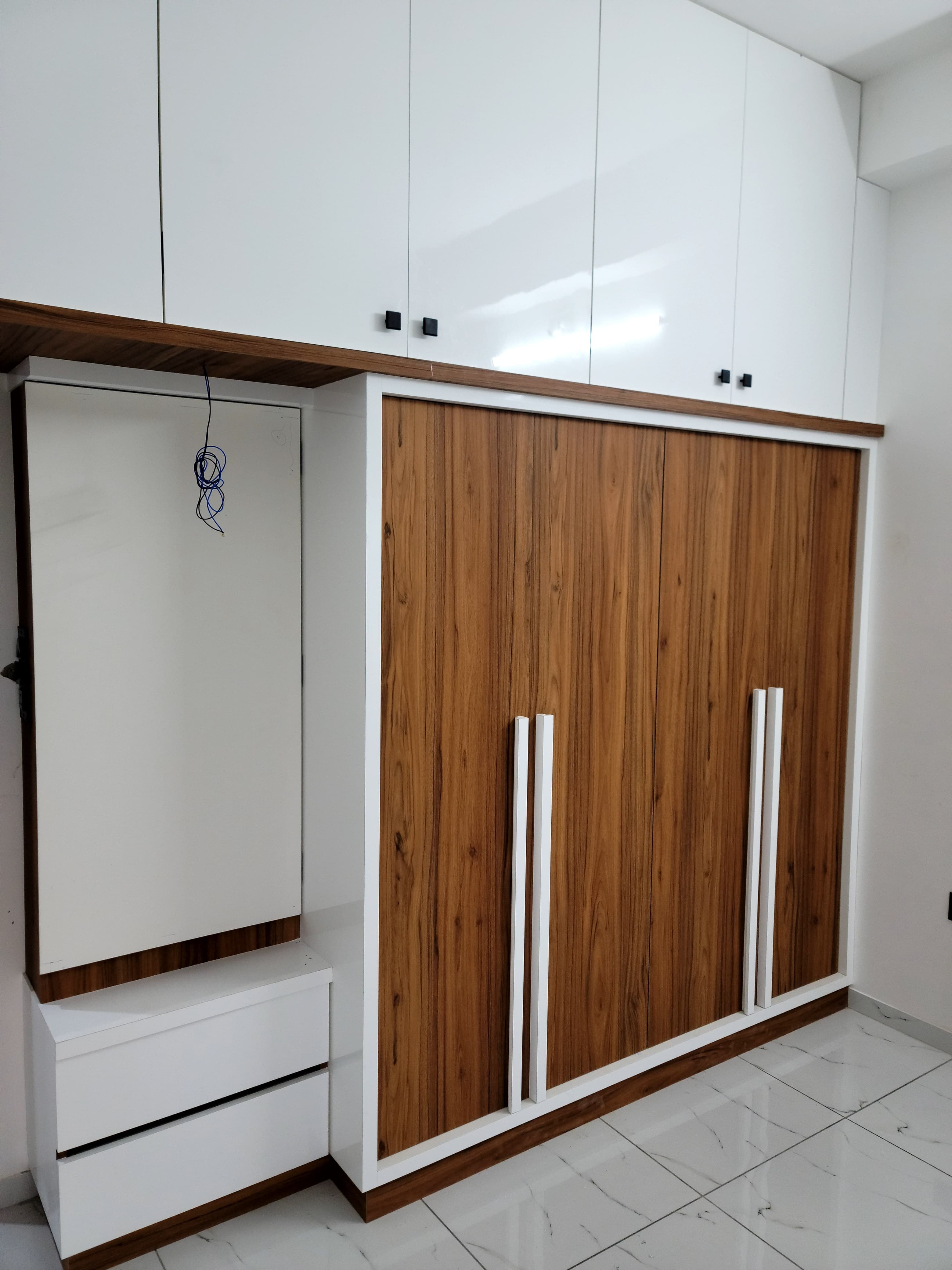 RAVYA wardrobe project — bedroom wardrobe in situ.