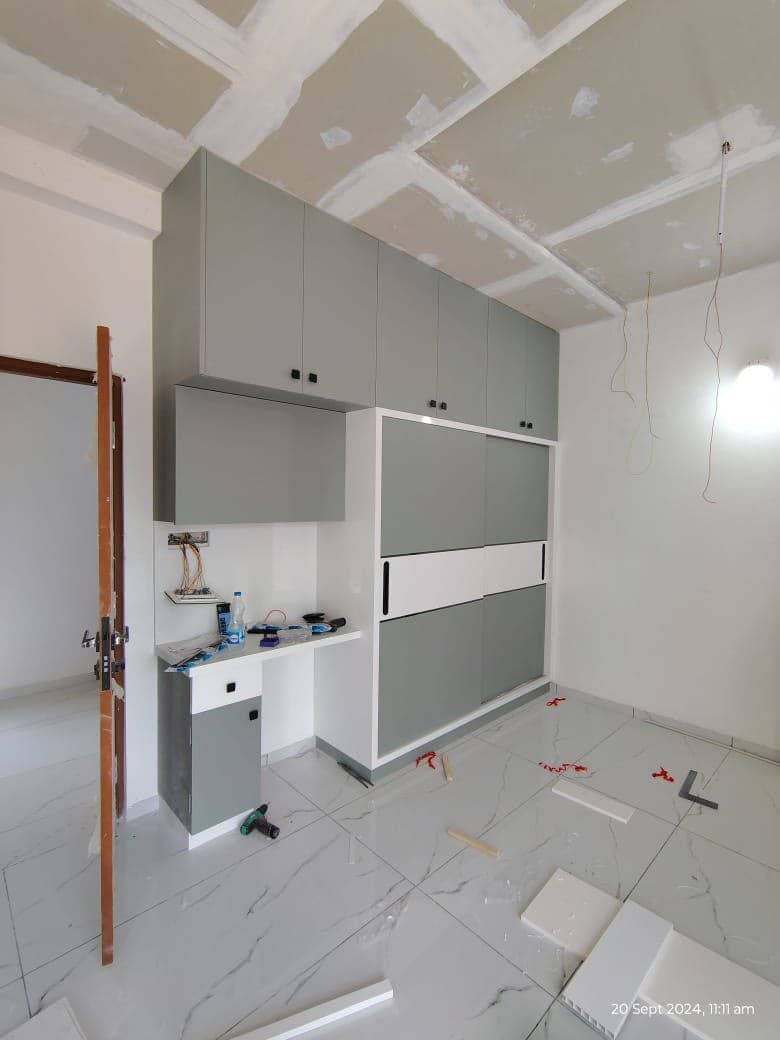 RAVYA wardrobe project — organised storage interior.